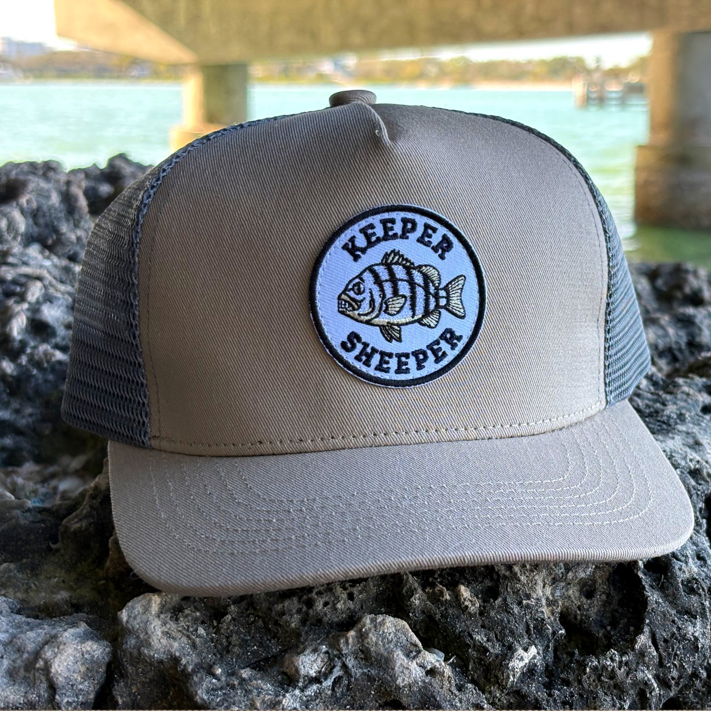 Sheepshead fishing hat lifestyle - angler wearing Keeper Sheeper trucker hat