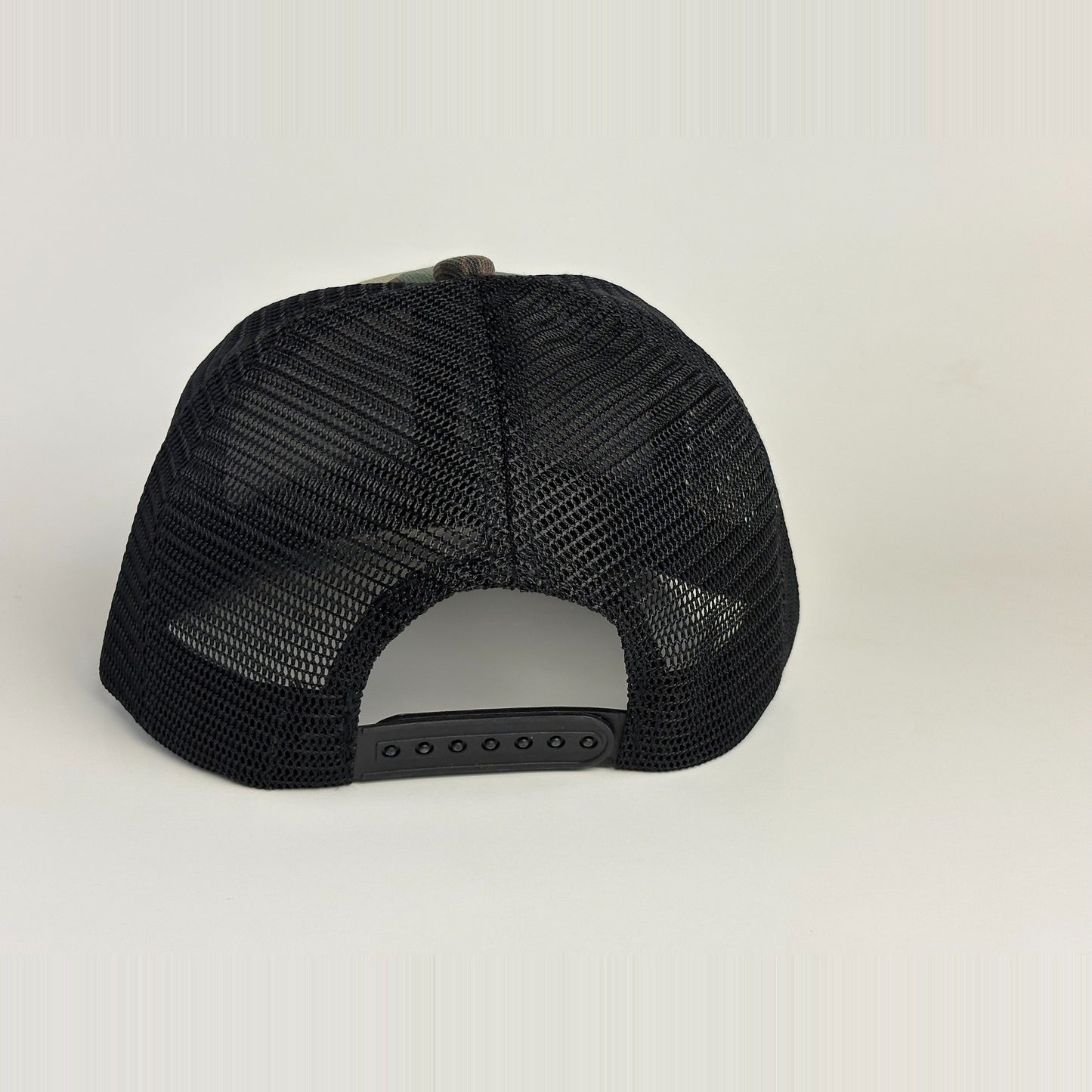 American flag camo hat back view - black mesh panels and snapback closure