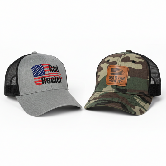 Two American flag trucker hats - grey Rad Reeler and woodland camo Life Is Fun hats